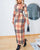 Long dress with checked and knotted details