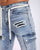 Irregular Spray Paint Workwear Blue Ripped Jeans